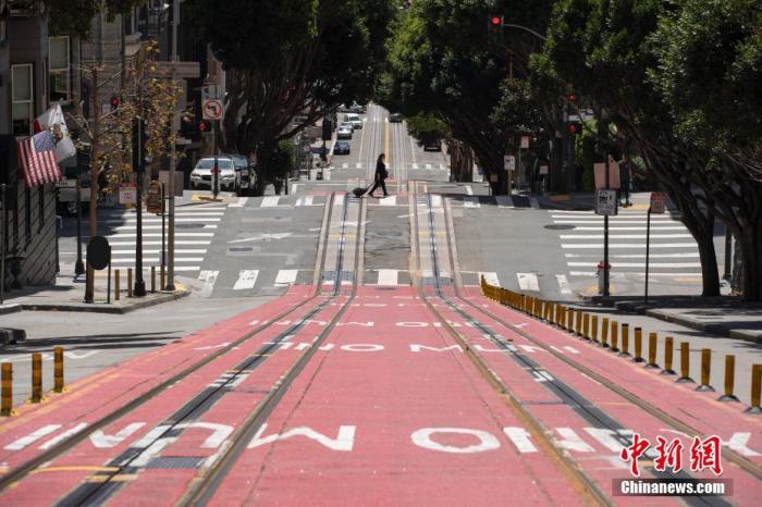 当地时间4月25日,美国旧金山街头冷冷清清。中新社记者 刘关关 摄 美国确诊病例已近百万例 世卫称新冠大流行远未结束